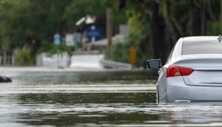 Can You Drive Your EV Through Flooded Roads? Safety Guide